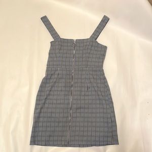 this slightly used blue plaid mini dress is super cute with its zipper